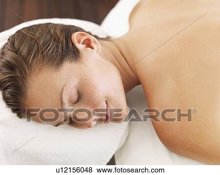 Woman relaxing in spa View Large Photo Image Stock Photo - Woman relaxing in spa. Fotosearch
