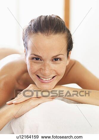 Stock Photo - Woman relaxing in spa. Fotosearch