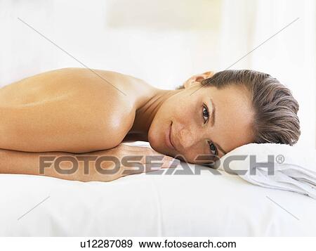 Stock Photo - Woman relaxing in spa. Fotosearch