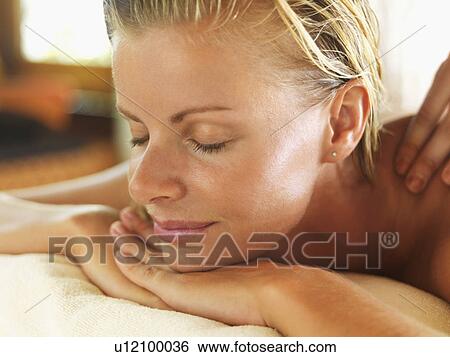 Stock Photograph - Woman relaxing in spa. Fotosearch