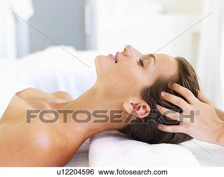 Stock Photograph - Woman relaxing in spa. Fotosearch