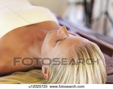 Stock Photography - Woman relaxing in spa. Fotosearch