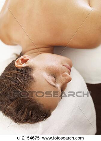Stock Photography - Woman relaxing in spa. Fotosearch