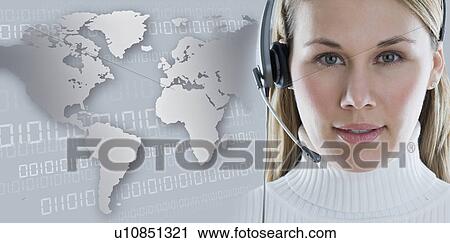 Stock Image - Woman with headset with world map in background. Fotosearch