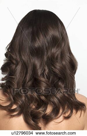 Woman's brown hair, studio shot View Large Photo Image Picture - Woman's brown hair, studio shot. Fotosearch