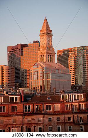 Boston Skyline at sunrise features Commerce House Tower, Boston, MA. View Large Photo Image Picture - Boston Skyline at sunrise features Commerce House Tower, Boston, MA.. Fotosearch
