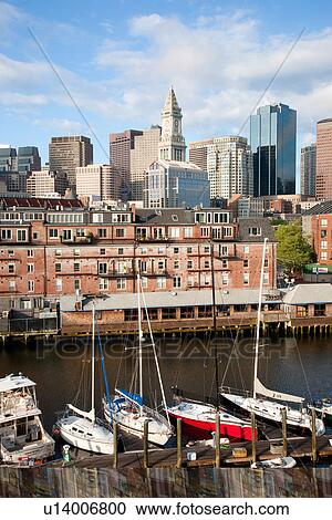 Boston Skyline at sunrise features Commerce House Tower and Harbor, Boston, MA. View Large Photo Image Stock Image - Boston Skyline at sunrise features Commerce House Tower and Harbor, Boston, MA.. Fotosearch