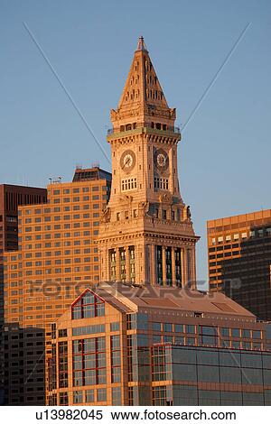 Boston Skyline at sunrise features Commerce House Tower, Boston, MA. View Large Photo Image Stock Photography - Boston Skyline at sunrise features Commerce House Tower, Boston, MA.. Fotosearch