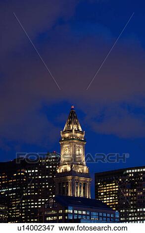 Stock Photo - Boston Skyline at sunset features Commerce House Tower, Boston, MA.. Fotosearch