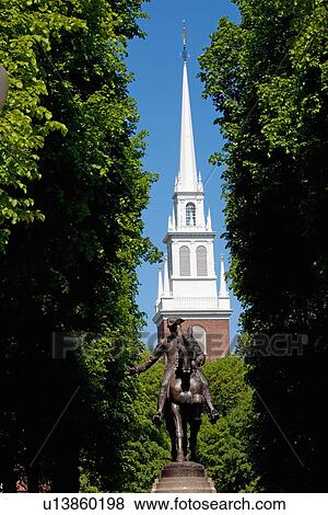 Stock Photo - Bronze Statue of Paul Revere on horse, Freedom Trail with Old North Church in background, Boston, MA. Fotosearch