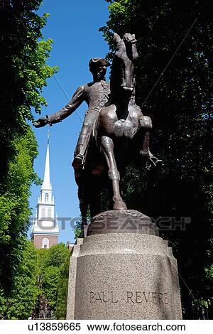 Stock Photography - Bronze Statue of Paul Revere on horse, Freedom Trail with Old North Church in background, Boston, MA. Fotosearch