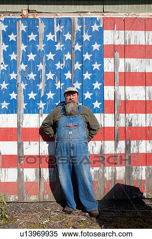 Howard poses in front of US Flag on Old Barn, Maine View Large Photo Image Stock Photography - Howard poses in front of US Flag on Old Barn, Maine. Fotosearch
