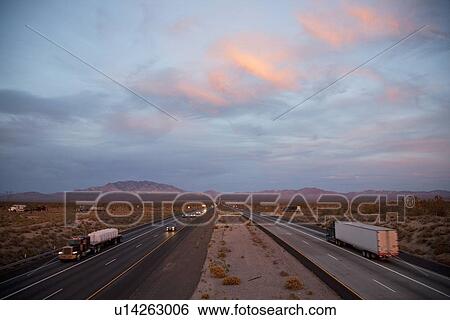 Interstate 15 highway at sunset with traffic to Las Vegas and California View Large Photo Image Stock Photograph - Interstate 15 highway at sunset with traffic to Las Vegas and California. Fotosearch