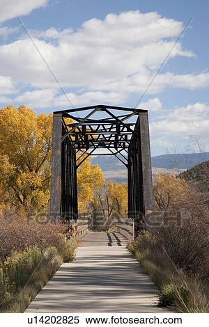 Iron Bridge on river bike trail, Ridgeway, CO View Large Photo Image Stock Photography - Iron Bridge on river bike trail, Ridgeway, CO. Fotosearch