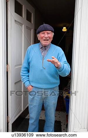 Stock Photo - Italian-American man in blue seater, North End, Boston, MA. Fotosearch