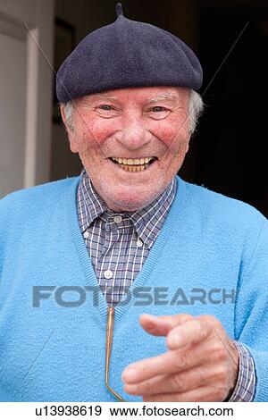 Stock Photo - Italian-American man in blue seater, North End, Boston, MA. Fotosearch
