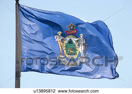 Stock Image - Maine State Flag in Blue Sky. Fotosearch