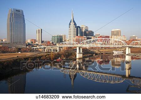 Stock Photo - Nashville Skyline, Tennessee and the Cumberland River with river reflection. Fotosearch