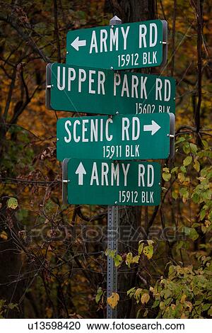 Stock Image - Road Signs in all directions. Fotosearch