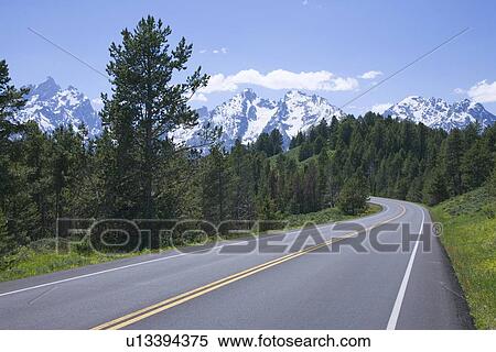 Road to Grand Tetons, Wyonming. View Large Photo Image Stock Photography - Road to Grand Tetons, Wyonming.. Fotosearch