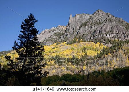 San Juan Mountains and autumn color behind Telluride, CO off mining road View Large Photo Image Stock Image - San Juan Mountains and autumn color behind Telluride, CO off mining road. Fotosearch