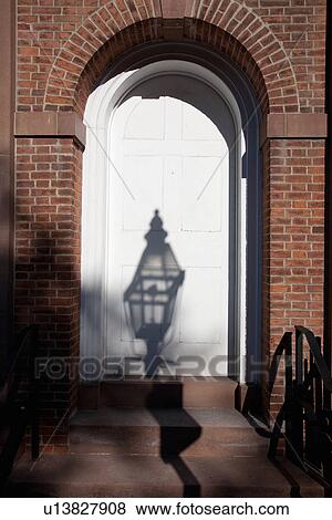 Shadows of city gas lamps, Hanover Street, Boston, MA View Large Photo Image Stock Photo - Shadows of city gas lamps, Hanover Street, Boston, MA. Fotosearch