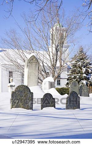 Stock Photography - Snowy Church and Cemetery. Fotosearch