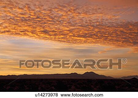 Stock Photo - Sunrise over mountains of California. Fotosearch