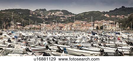 Boats docked in harbor View Large Photo Image Stock Photo - Boats docked in harbor. Fotosearch