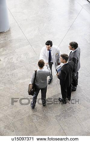 Business people and doctor greeting View Large Photo Image Stock Image - Business people and doctor greeting. Fotosearch