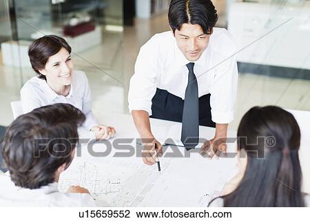 Business people talking in meeting View Large Photo Image Stock Image - Business people talking in meeting. Fotosearch