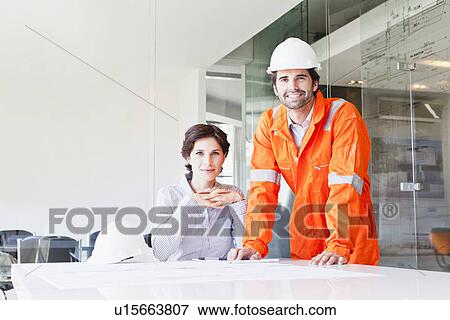 Business people talking in meeting View Large Photo Image Stock Photo - Business people talking in meeting. Fotosearch