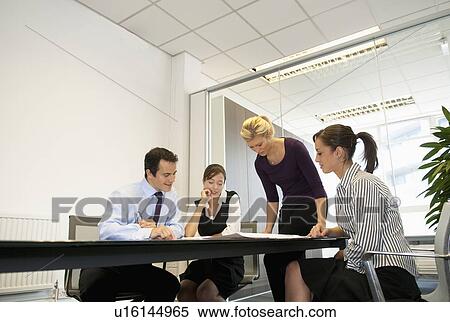 Business people talking in meeting View Large Photo Image Stock Photography - Business people talking in meeting. Fotosearch