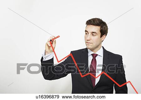 Stock Photo - Businessman drawing graph in air. Fotosearch