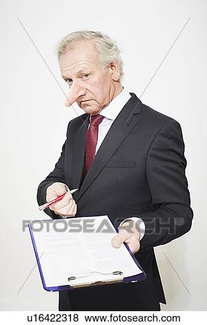 Stock Photo - Businessman with long nose and contract. Fotosearch