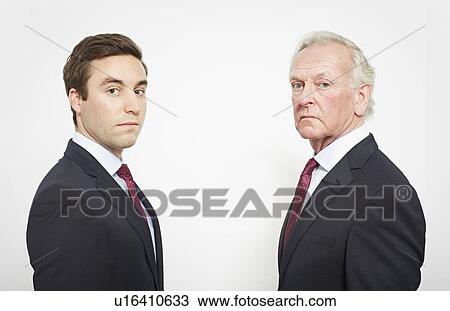 Businessmen facing each other View Large Photo Image Stock Image - Businessmen facing each other. Fotosearch