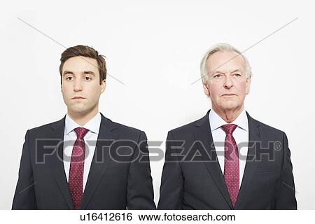 Businessmen standing together View Large Photo Image Stock Photograph - Businessmen standing together. Fotosearch