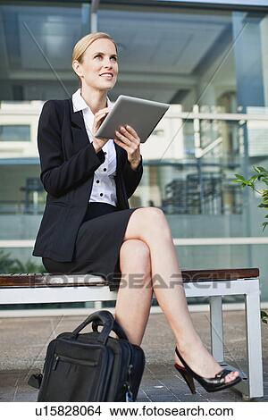 Picture - Businesswoman using tablet computer. Fotosearch