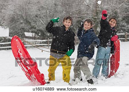 Stock Photo - Children having snowball fight. Fotosearch