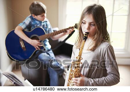 Children playing music together View Large Photo Image Stock Image - Children playing music together. Fotosearch