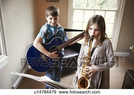 Children playing music together View Large Photo Image Stock Photo - Children playing music together. Fotosearch