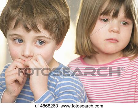 Children sitting together indoors View Large Photo Image Stock Image - Children sitting together indoors. Fotosearch