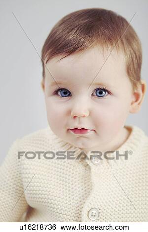 Close up of baby girls face View Large Photo Image Stock Photograph - Close up of baby girls face. Fotosearch
