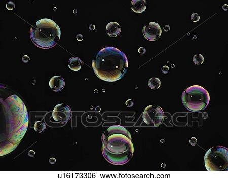 Stock Photograph - Close up of bubbles on black background. Fotosearch