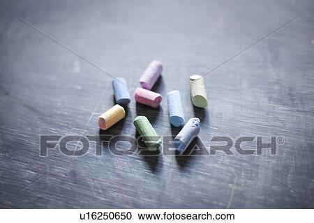 Close up of colorful chalk on blackboard View Large Photo Image Stock Image - Close up of colorful chalk on blackboard. Fotosearch