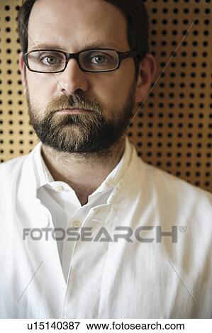 Close up of doctors serious face View Large Photo Image Stock Photo - Close up of doctors serious face. Fotosearch
