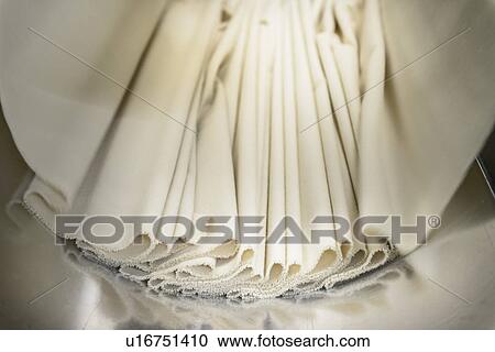 Close up of fabric in textile mill View Large Photo Image Stock Image - Close up of fabric in textile mill. Fotosearch