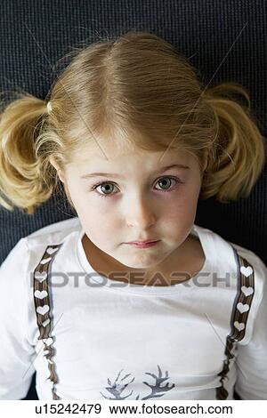 Close up of girls serious face View Large Photo Image Stock Photo - Close up of girls serious face. Fotosearch