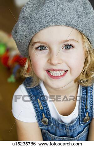 Stock Photograph - Close up of girls smiling face. Fotosearch