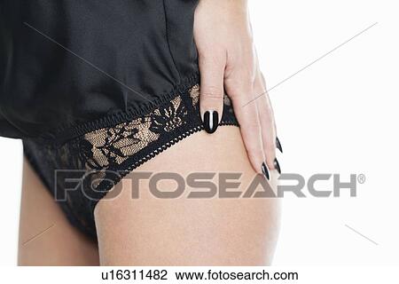 Close up of woman wearing lace panties View Large Photo Image Stock Image - Close up of woman wearing lace panties. Fotosearch